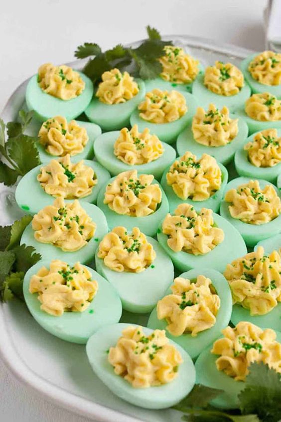 St. Patrick's Day Deviled Eggs not only taste great but they look amazing! Simply add green food coloring for a St. Patrick's Day treat! #st.patrick'sdaytreats
