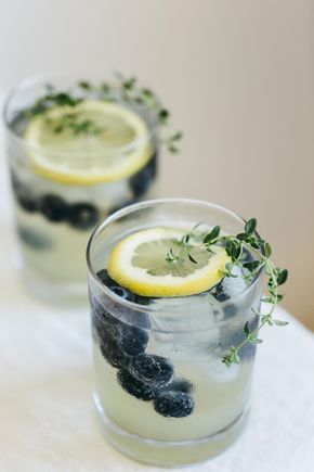 Limoncello features in many summer cocktails due to its refreshing, tart lemon flavor add blueberries and thyme and you have the perfect refreshing summer cocktail. #summercocktails #limoncello #prosecco