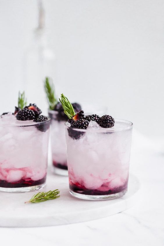 Summer time is berry time, so what better ingredient for your summer cocktails than adding blackberries! This super colorful cocktail looks delicious an is refreshing on a summers day or evening. Great for Pool parties, picnics or just sitting back and watching the world go by from your porch. #summercocktails #blackberrycocktails #Ginandtonic