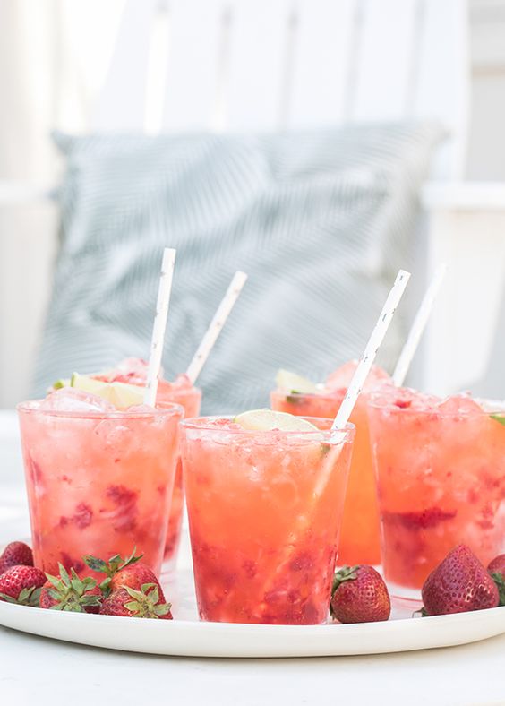Try a different kind of summer cocktail this year, a Strawberry Tequila Soda! You may think Gin, Vodka or Rum is better suited to this tonic, but you will be pleasantly suprised with how refreshing it is! Just 4 ingredients! Great for sipping on the porch on a hot summers day! #summercocktail #tequilasoda #strawberrytequila