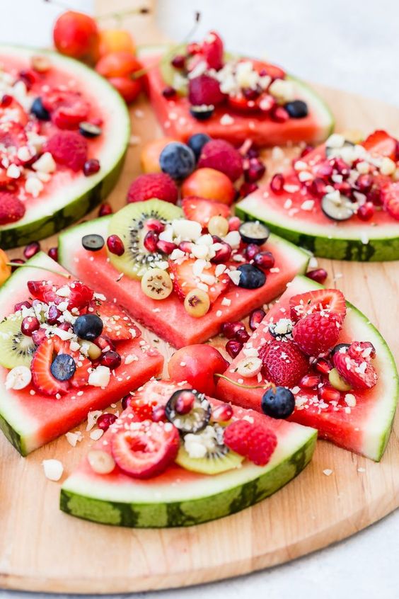 Watermelon pizza! Not all pizza needs not be unhealthy, this creative, colorful and healthy watermelon pizza makes for the prefect healthy Summer Appetizer. Video Instructions!