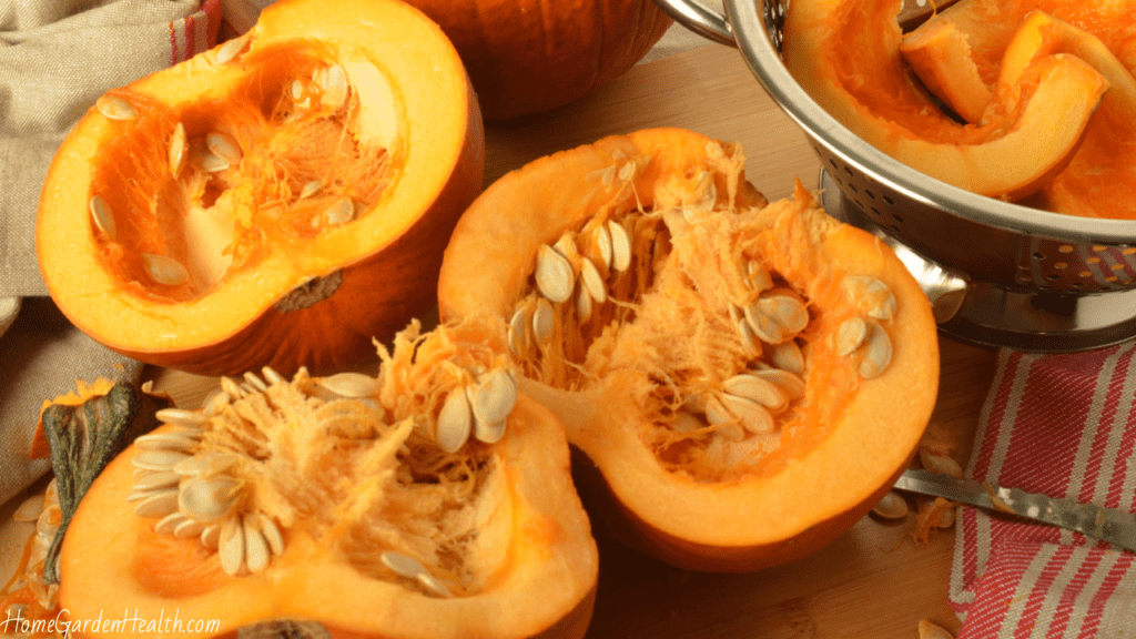 Pumpkin Halves Cut on kitchen bench for soup