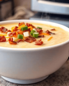 A warm cozy bowl of loaded baked potato soup