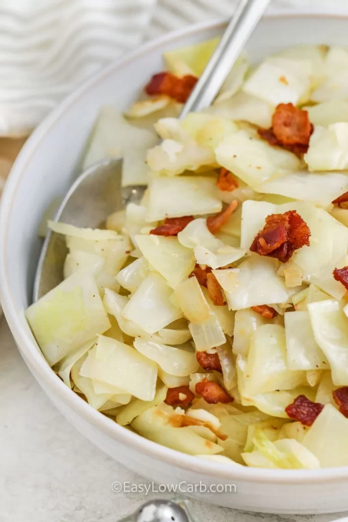 fried cabbage and bacon in a bowl